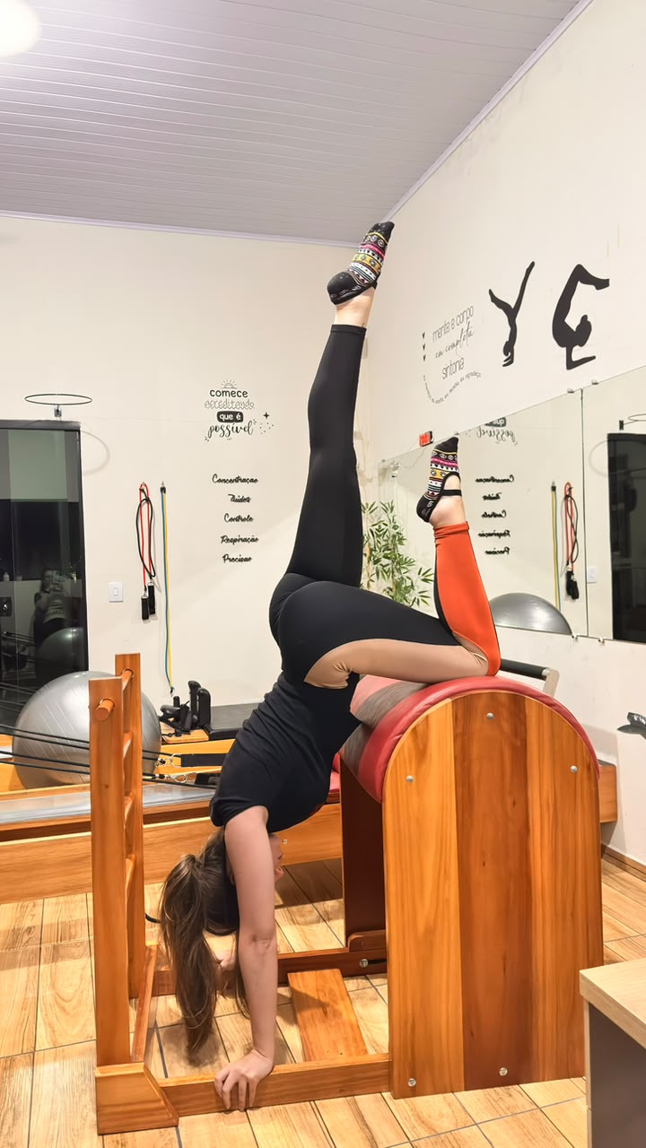 Aula de Pilates no aparelho